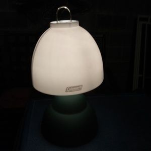 Two coleman battery powered camping lanterns